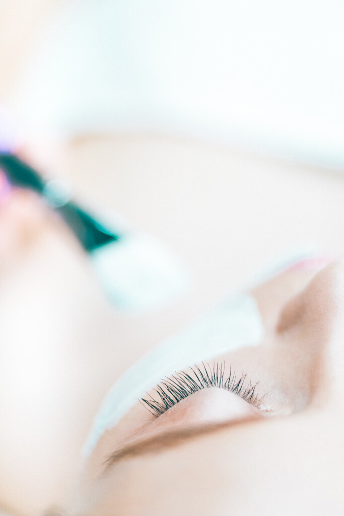 A close-up of a relaxing facial treatment at Blossom